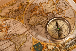 bigstock_old_map_and_compass_concepts_61330781